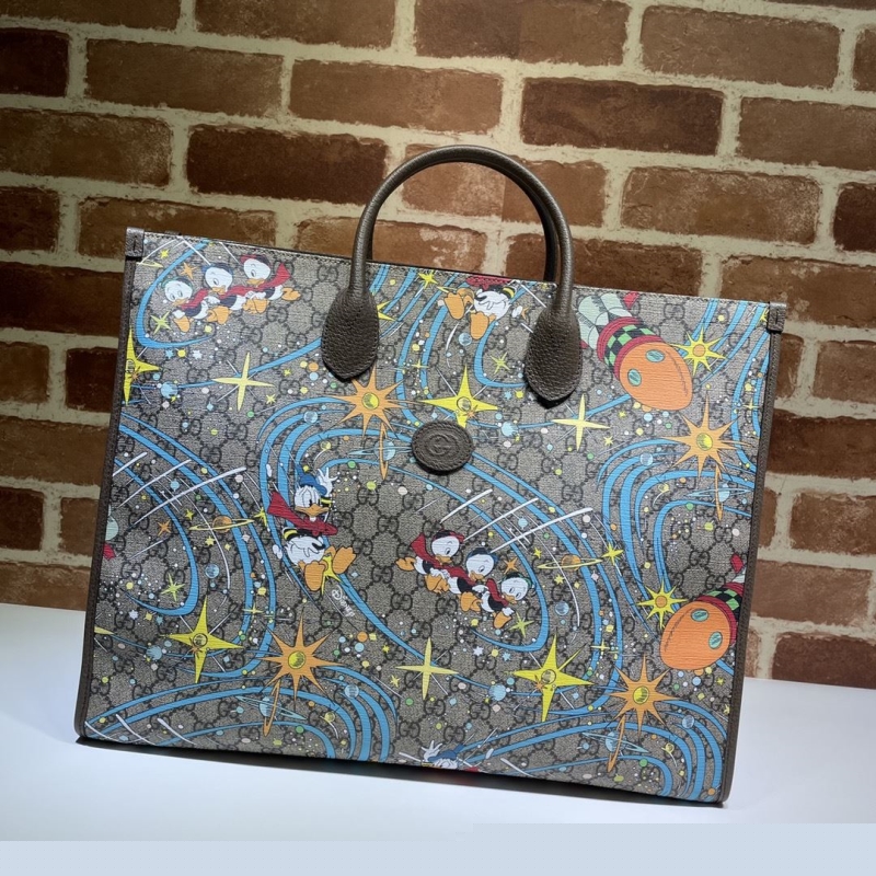 G*u*i shopping bags